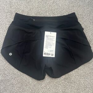 BLACK SPEED UP SHORTS SIZE 4